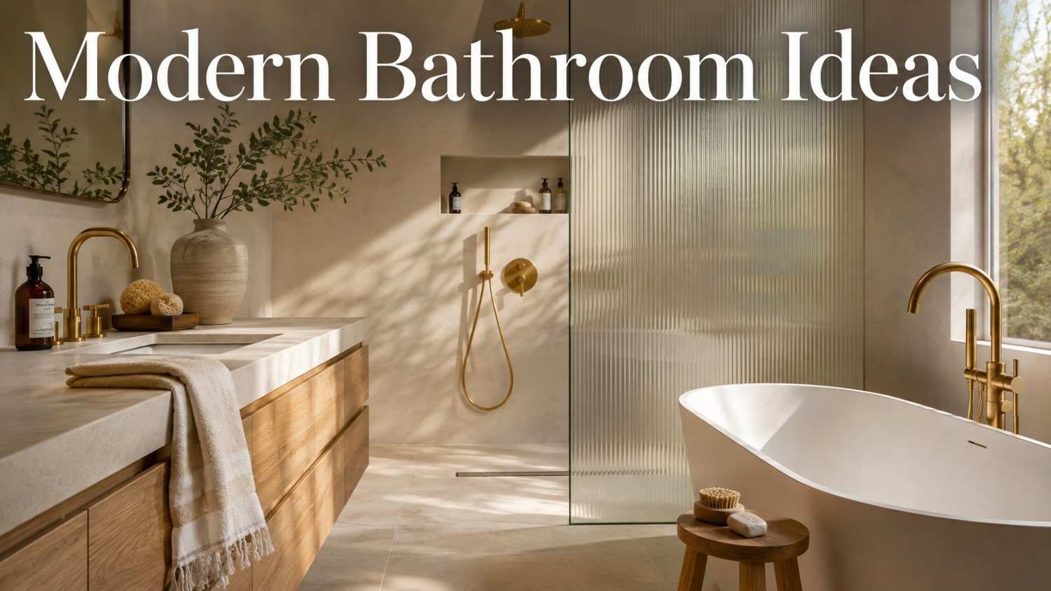 Warm white bathroom with brushed brass fixtures and floating oak vanity — a modern bathroom idea in soft morning light.