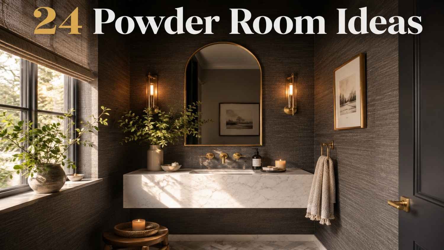 Charcoal powder room with marble vanity and brass sconces — moody powder room ideas.