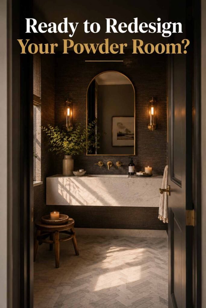 Powder room viewed through open doorway with brass mirror and marble vanity.