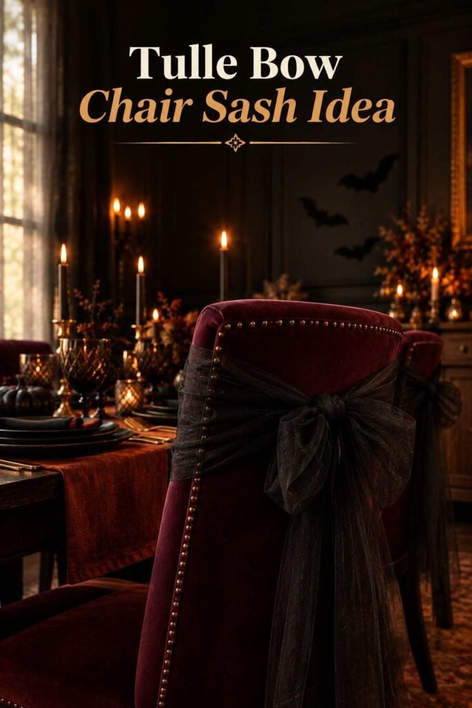 A black tulle bow tied to the back of a dining chair with a bat silhouette decal visible on the wall behind it.